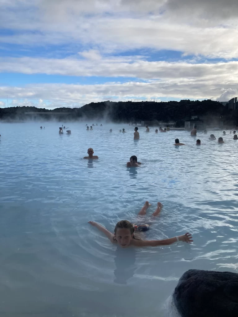 Kids playing at Blue Lagoon near Golden Circle Iceland